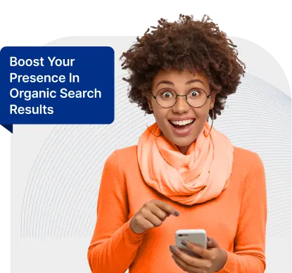 a woman holding a phone