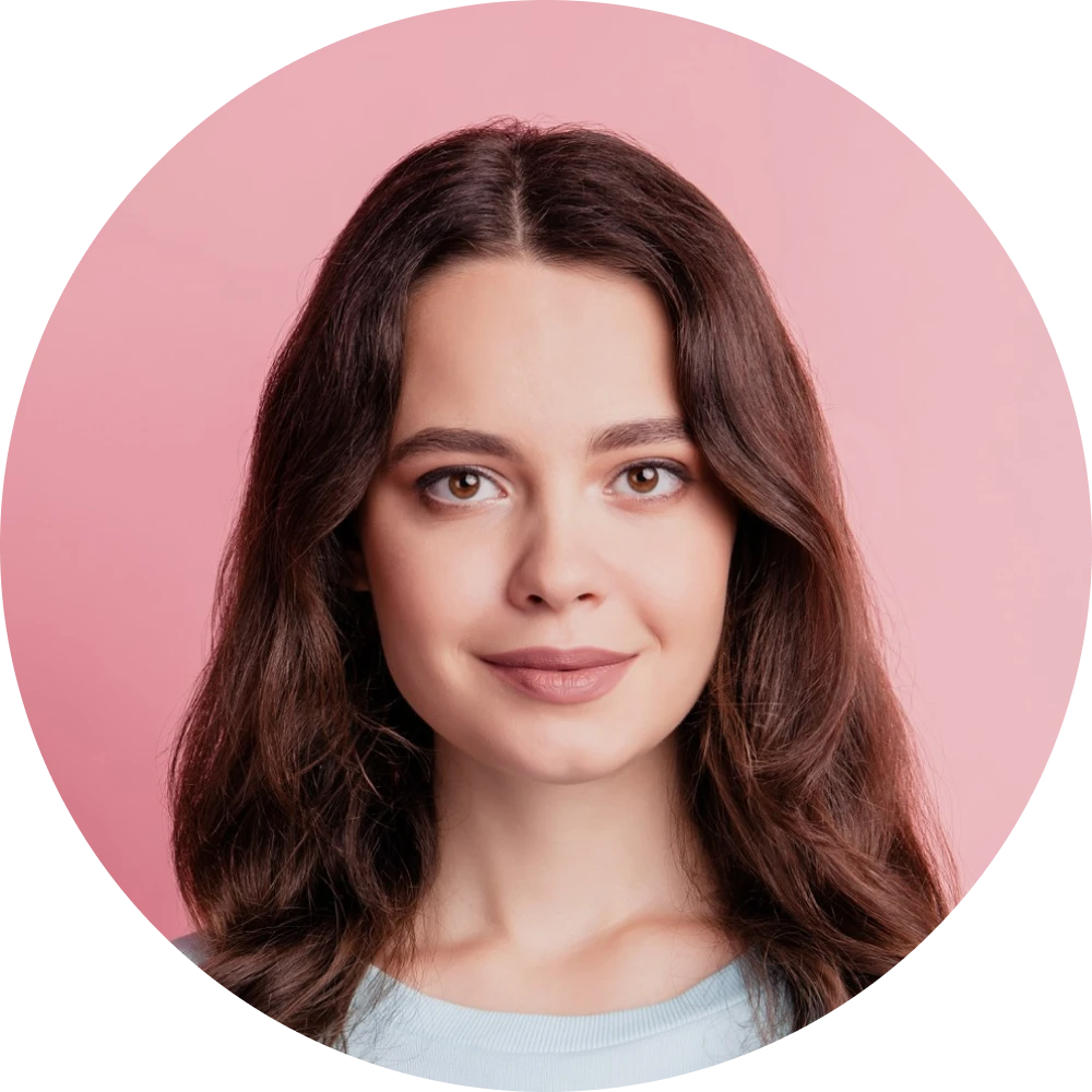 Long wavy hair against pink background.